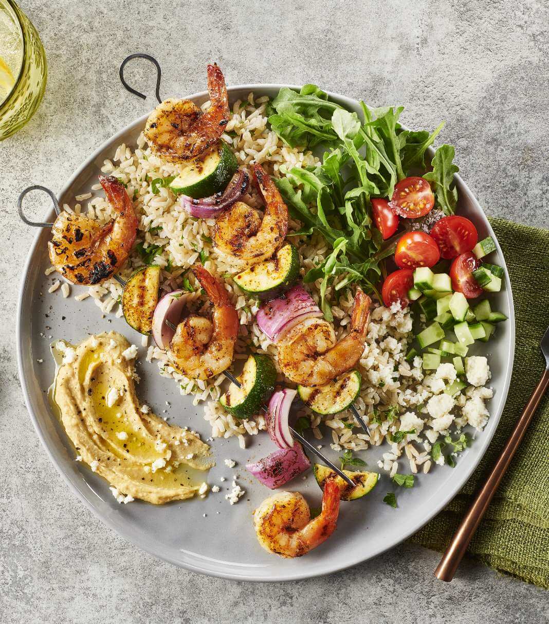 Mediterranean-Style Shrimp Kabobs over rice