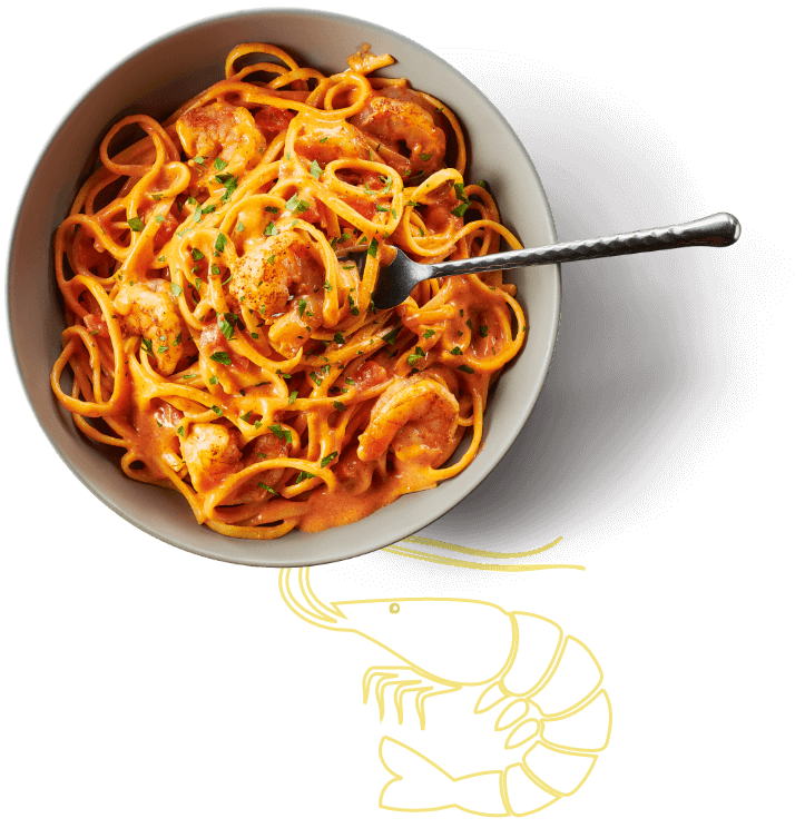 a bowl of cajun shrimp pasta